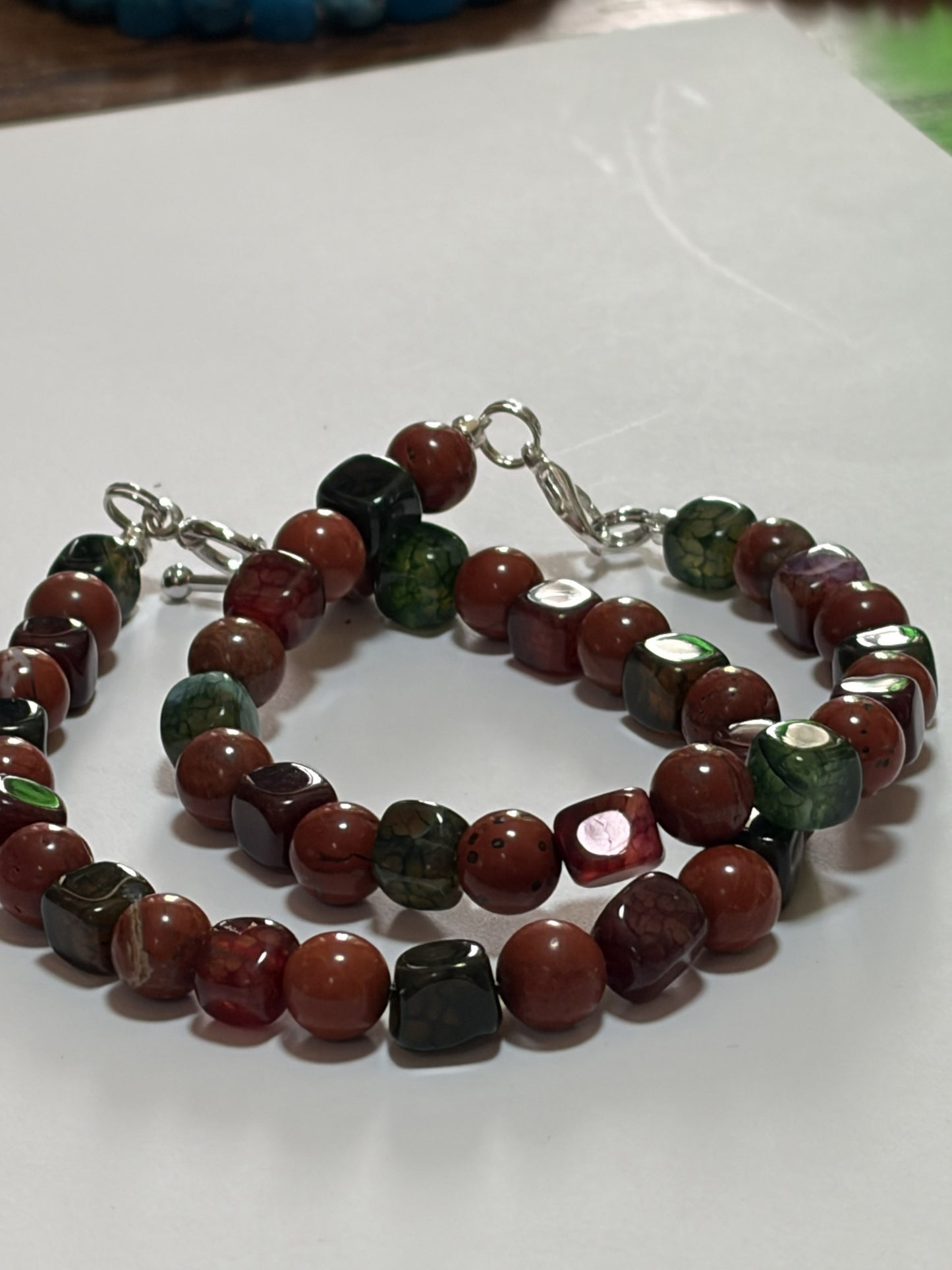 Square stone couples bracelet set by Sylvia Leroux with 8mm striped agate stones, silver lobster clasp, and matching design for couples.