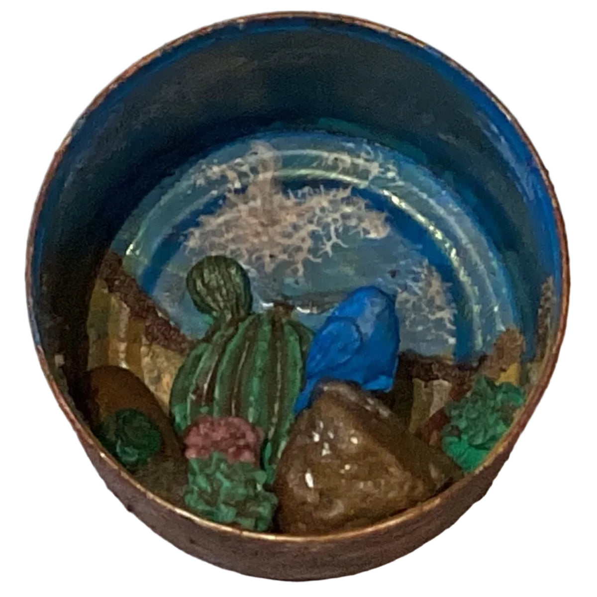 Western-themed tin terrarium with desert decor, featuring a rustic ambiance and miniature cacti in a handcrafted Ysleta Mission style.