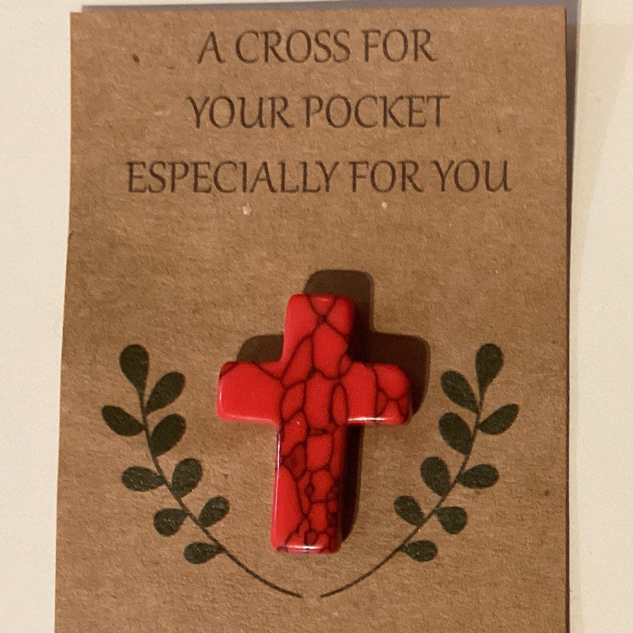 Semi-precious stone cross in pocket, Catholic Christian gift, 1 inch, featuring a detailed crucifix design.