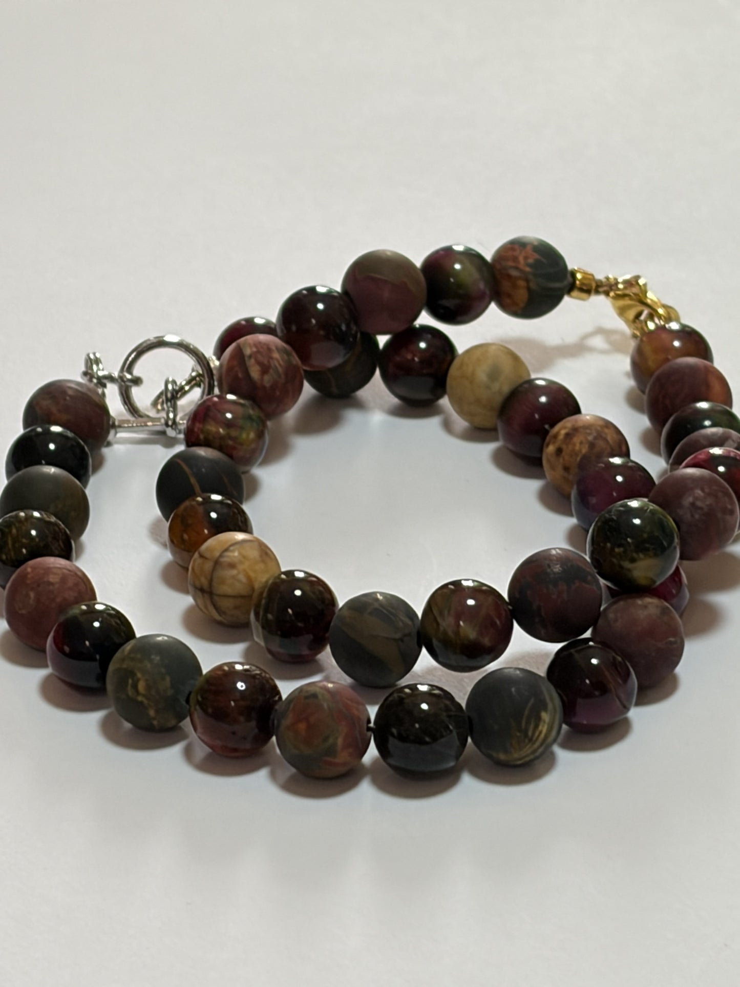 Brown natural stone couples bracelet with 8mm beads, Sylvia Leroux jewelry featuring dragon vein agate and jasper with gold and silver clasps.