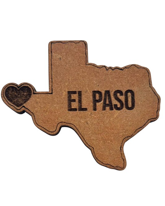 Texas-shaped laser cut wood magnet by Norma Cordova De Schaefer, 2x2 inches, El Paso souvenir with detailed wood design.