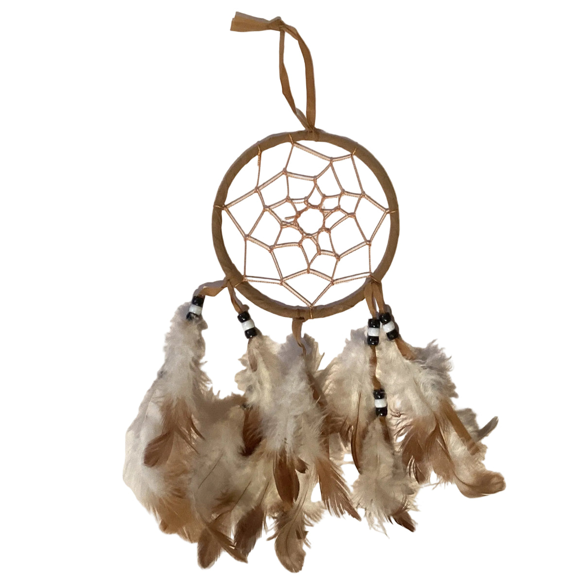 Earth-tone dreamcatchers hanging as wall art, featuring woven designs and feathers, from Ysleta Mission Gift Shop for home decor.