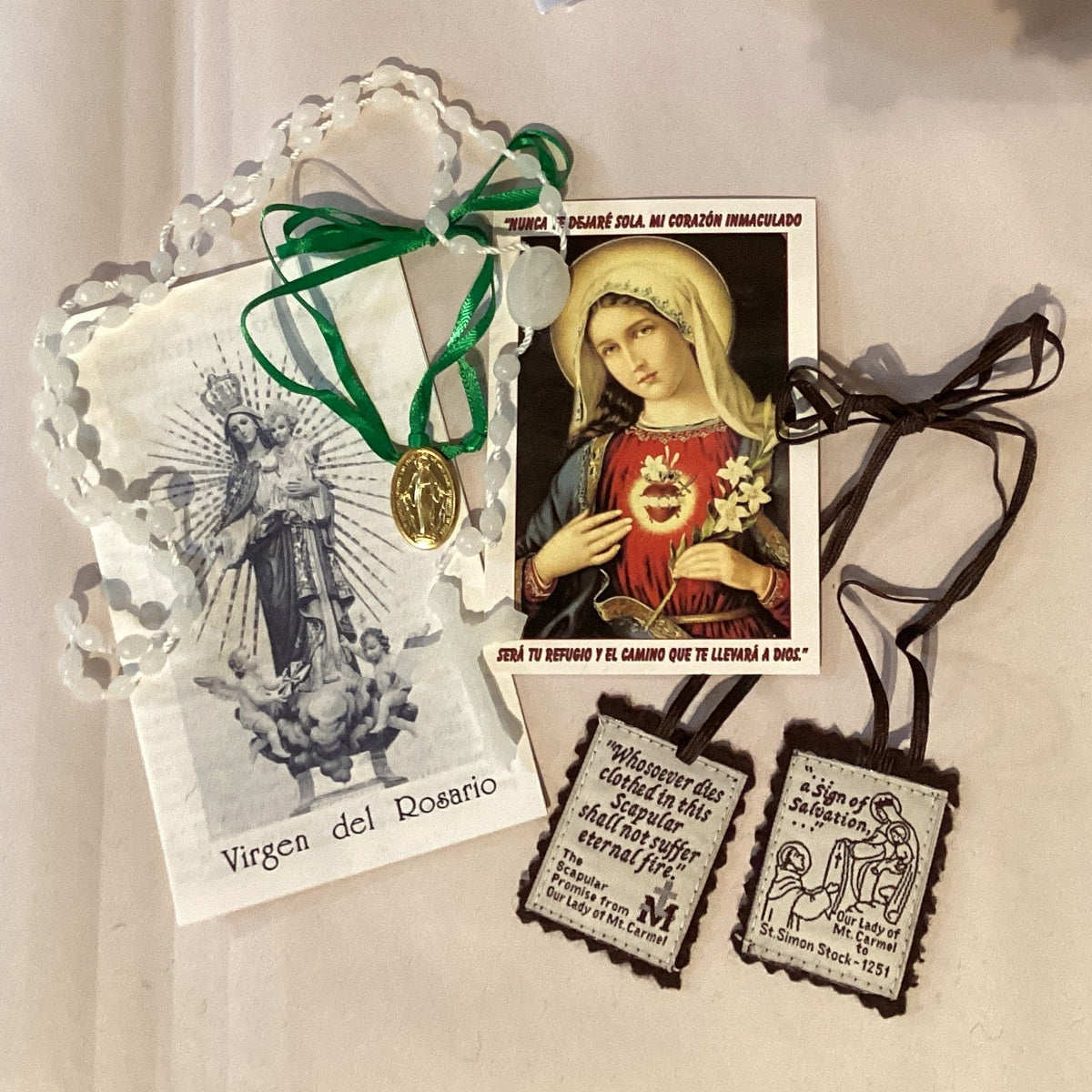 Catholic Marian prayer set with rosary, scapular, medal, and prayer cards featuring the Immaculate Conception image.