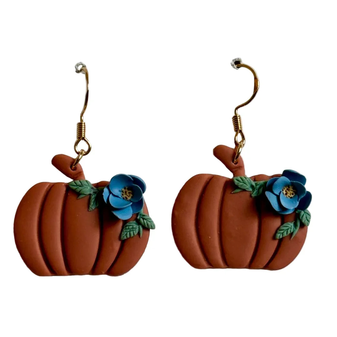 Pumpkin polymer clay dangle earrings with blue floral design