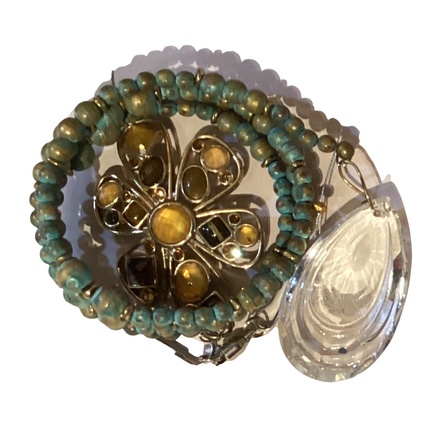 Handmade 16-inch spiral suncatcher featuring turquoise copper patina flower, pearlized beads, and crystal rainbow teardrop prism.