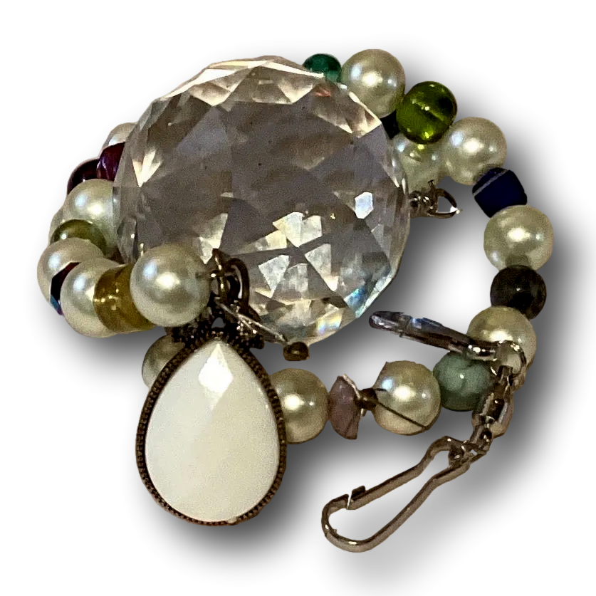 Handmade 16-inch crystal suncatcher with swirl design, pearlized beads, teardrop accents, and faceted crystal prism sphere.