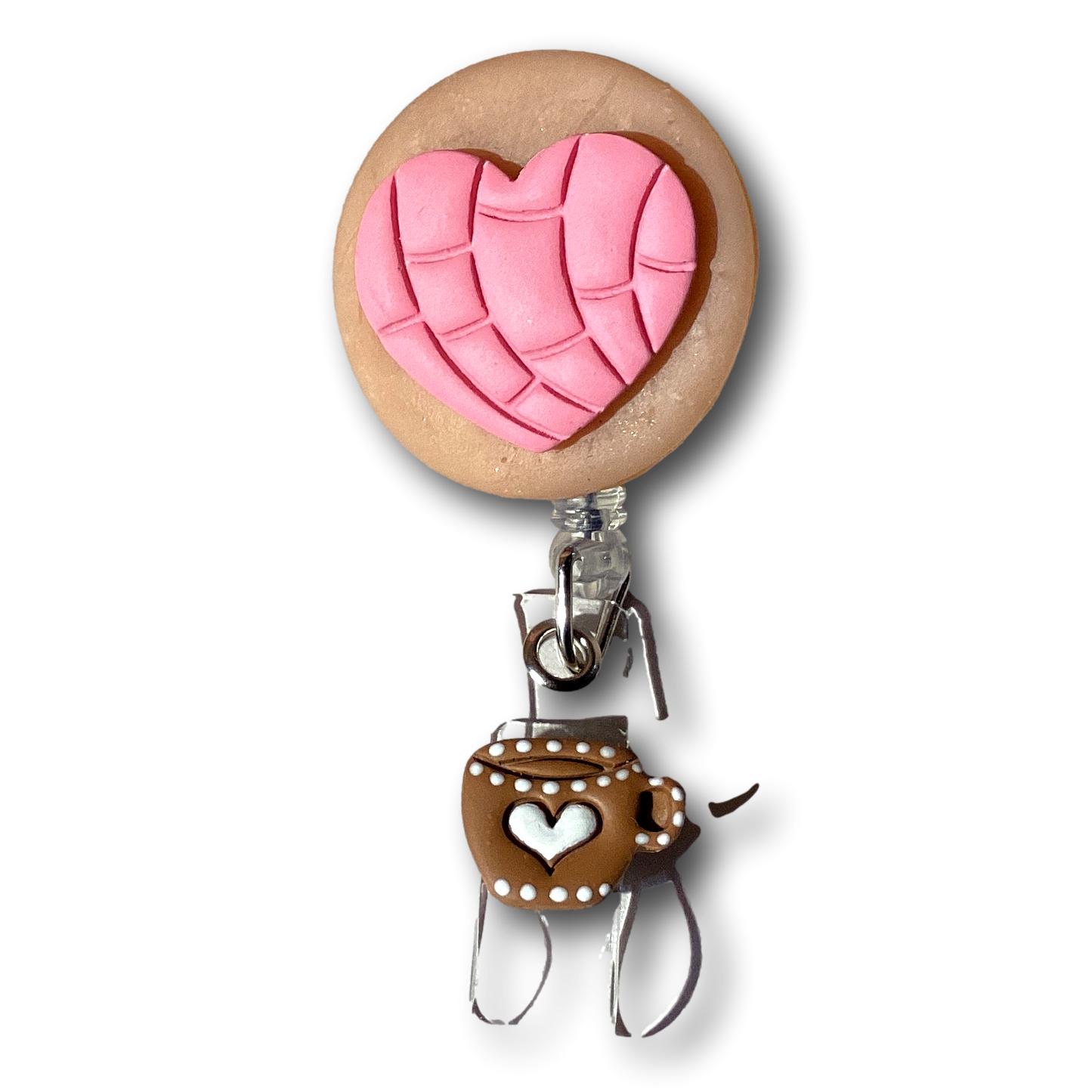 Melissa Cortinas Heart Concha badge holder with coffee cup dangle, retractable reel for ID badges, stylish and functional wearable accessory.