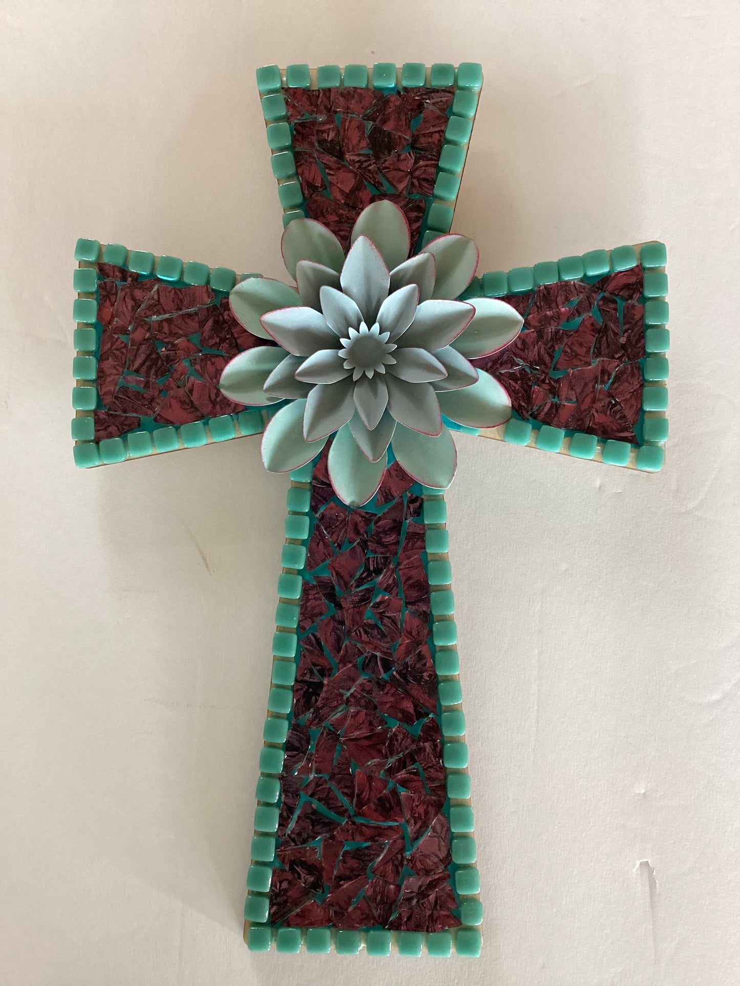 Glass cross on wood with teal flower, 12x11 inches, Catholic Christian gift from Brigitte Rosson, detailed and decorative religious decor.