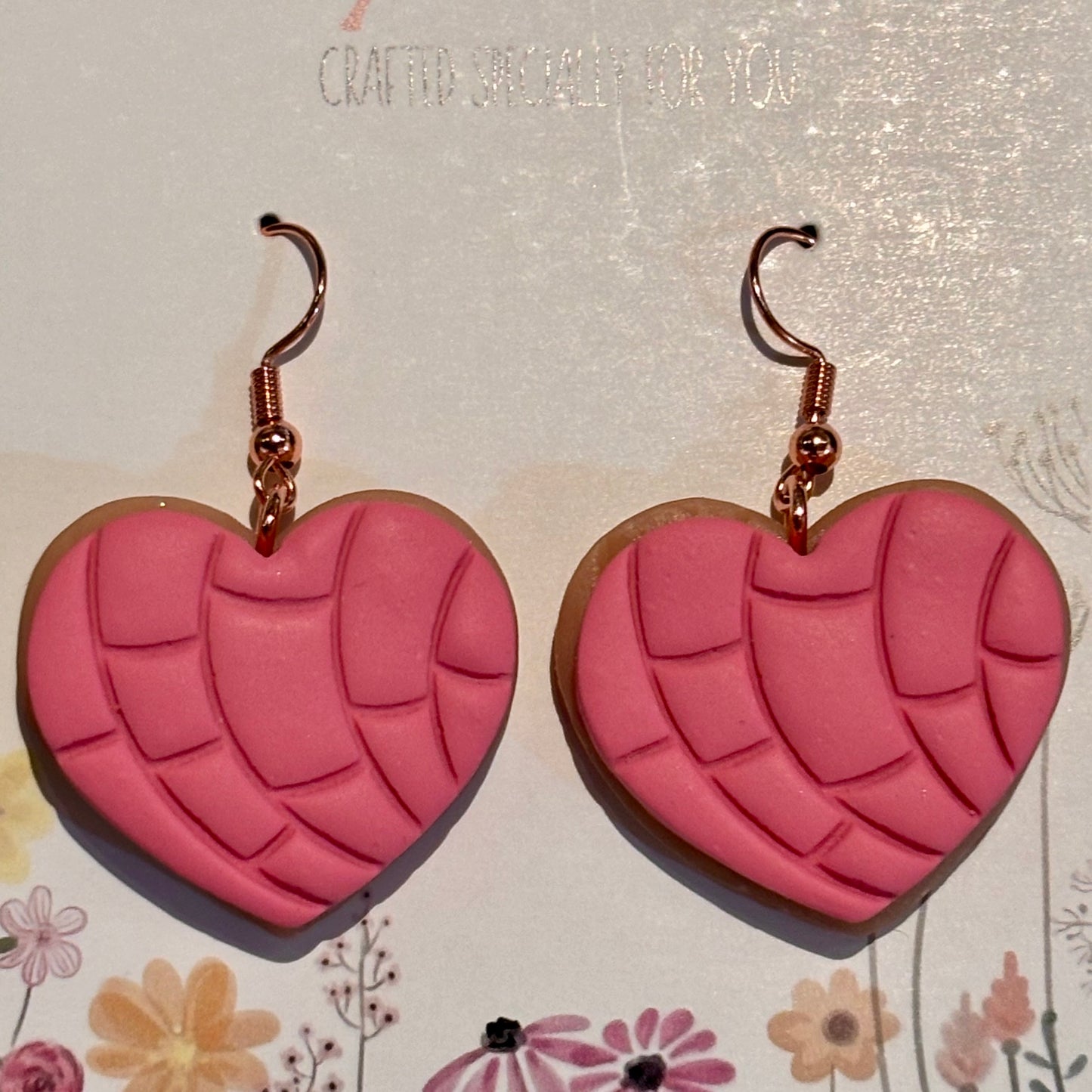 Pink polymer clay concha heart earrings with rose gold hooks, handcrafted, lightweight, nickel-free jewelry.