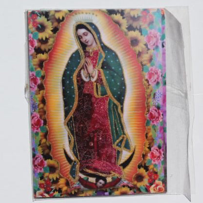 Magnet Virgin souvenir by Miguel Martinez featuring a 2.5 x 3.5 inch design with religious imagery, suitable for collection or display.