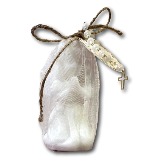 Handcrafted rose-scented Catholic devotional candles with a rosary, featuring religious imagery and intricate details.