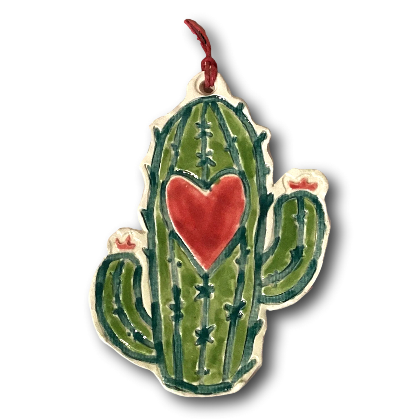 Red ceramic cactus ornament by Lorena Williams, decorative home accent in a vibrant, detailed cactus shape for garden or interior decor.