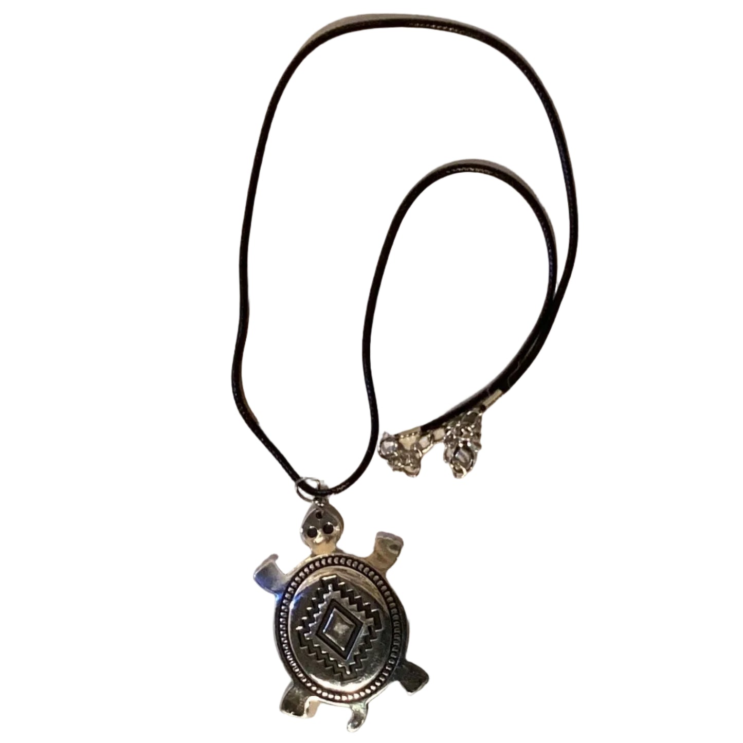 Silver-tone turtle pendant necklace with Southwestern geometric design on black cord, 18-inch jewelry by Ysleta Mission Gift Shop.