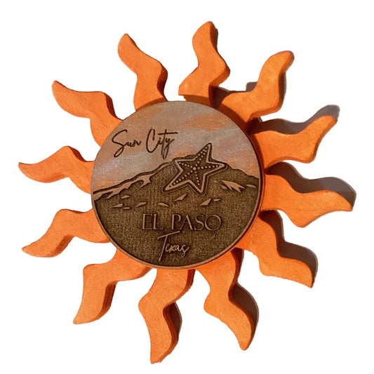 Yellow and blue Sun City El Paso Star Mountain wall decor ornament with star design, decorative wall piece from Ysleta Mission Gift Shop.