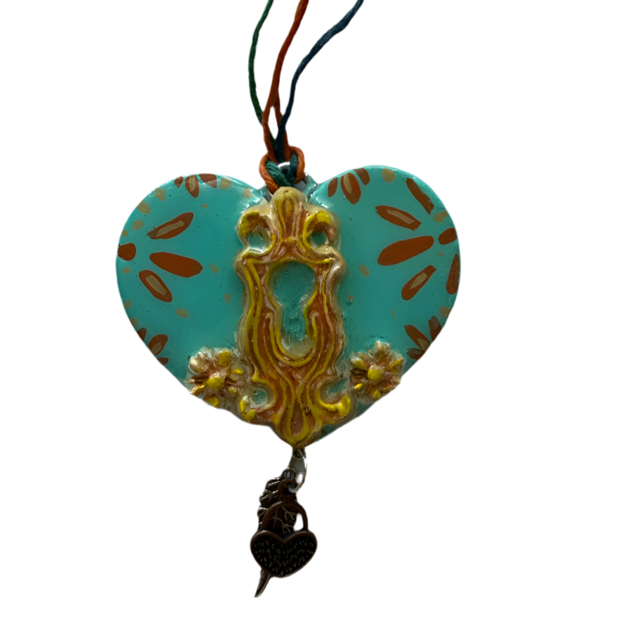 Teal sculpted clay heart ornament with hanging loop 2 x 2.5 in