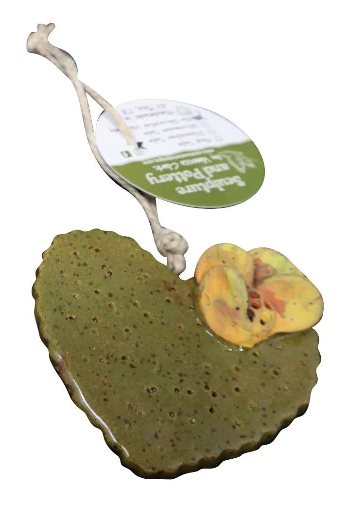 Handcrafted ceramic prickly pear cactus ornament by Vanessa Clark, perfect for Southwest desert decor in home and garden settings.