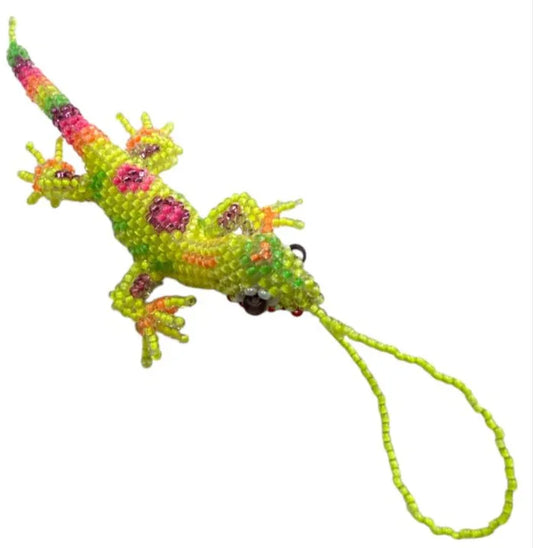 Handcrafted Mexican beaded lizard folk art charm, 4.5 inches, by Jose Alberto Chavez, designed as a purse or wallet accessory.