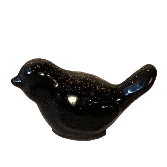 Black glitter perched bird figurine, 2-inch mini resin art piece for home decor, crafted by Ysleta Mission Gift Shop.