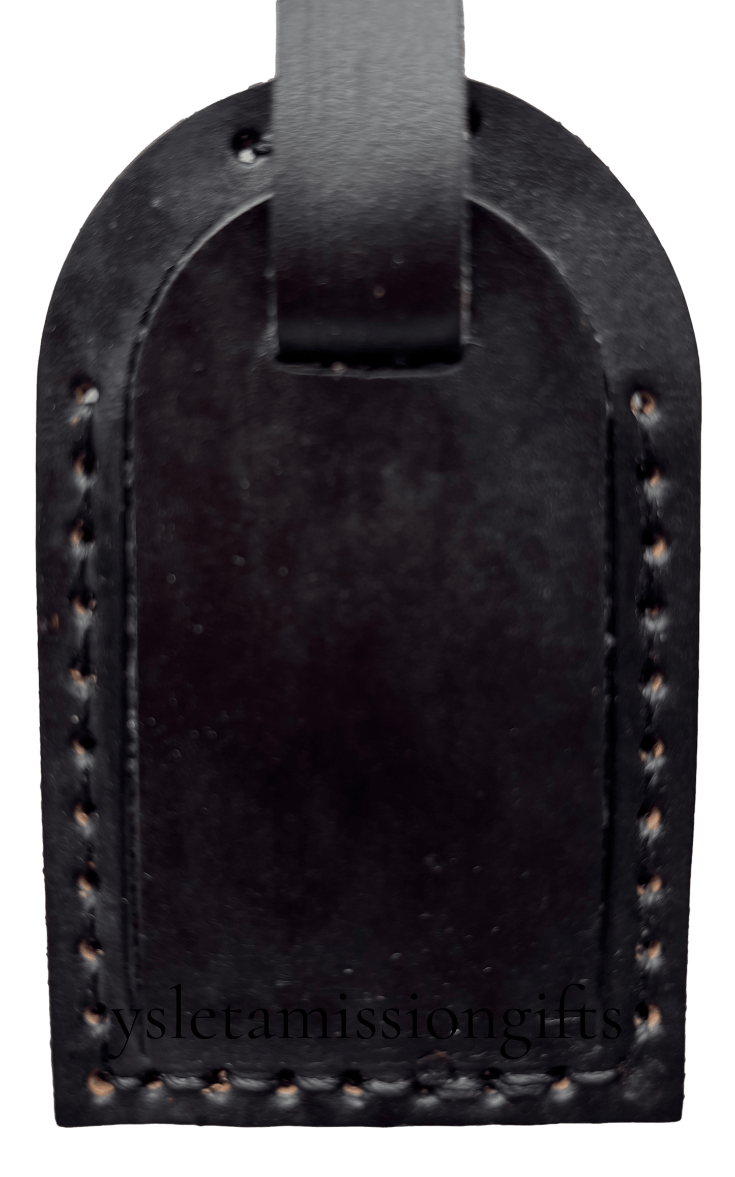 Black leather luggage tag by Consuelo Barraza, designed for travel accessories, with a sleek and durable appearance.