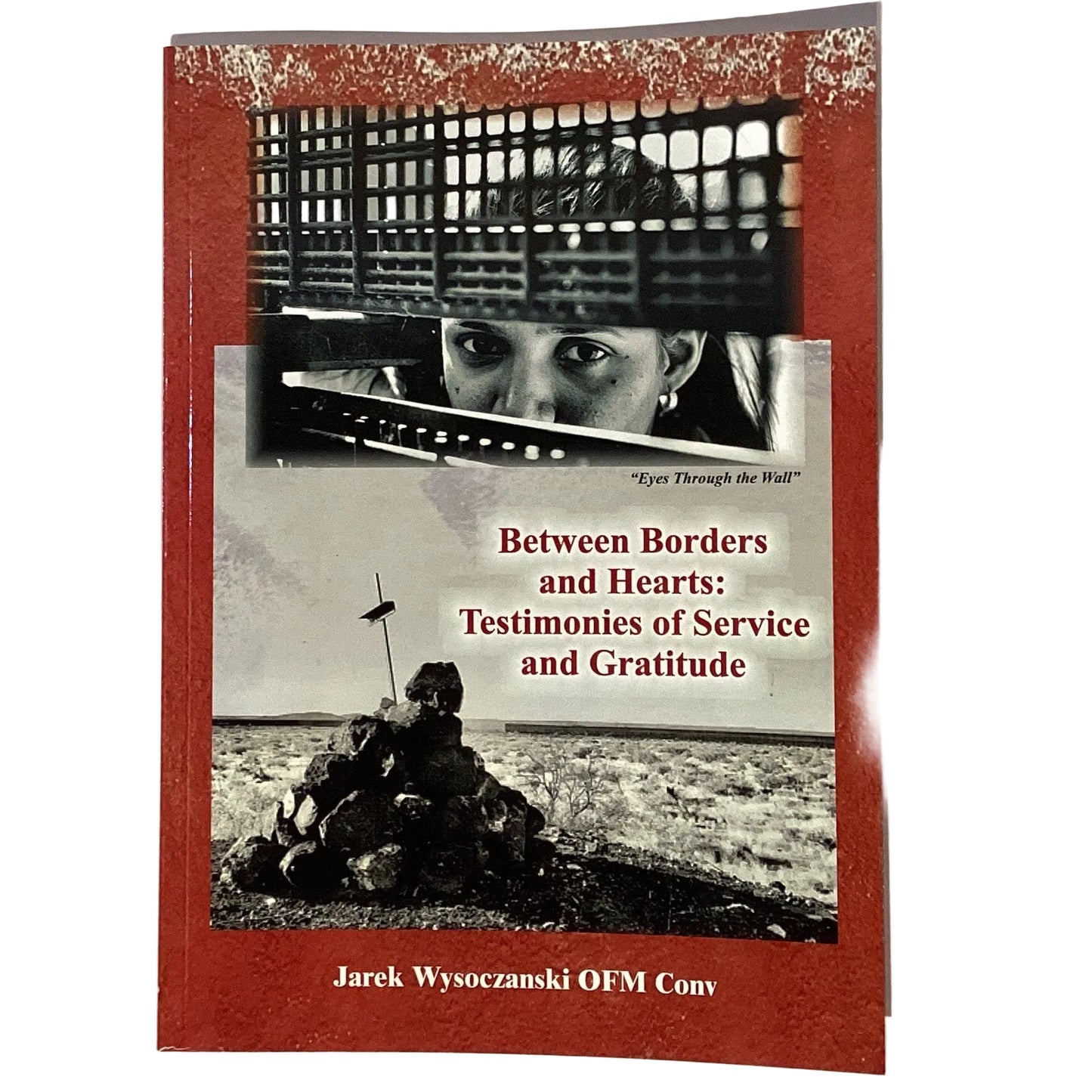 Catholic book "Between Borders and Hearts" by Father Jarek Wysoczanski showing the cover with title and author.