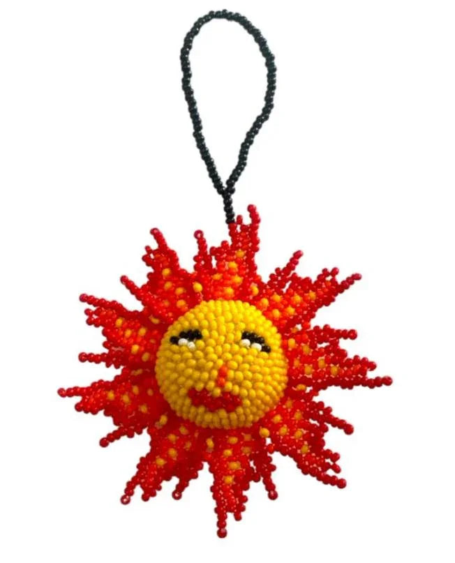 Handmade beaded sun-shaped ornament by Jose Alberto Chavez, vibrant Mexican folk art for bag decoration or wall display.