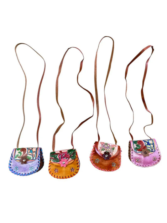 Mini hand-tooled leather bag with floral design, 4x4.5 inches, by Jose Alberto Chavez, perfect for children's purses.