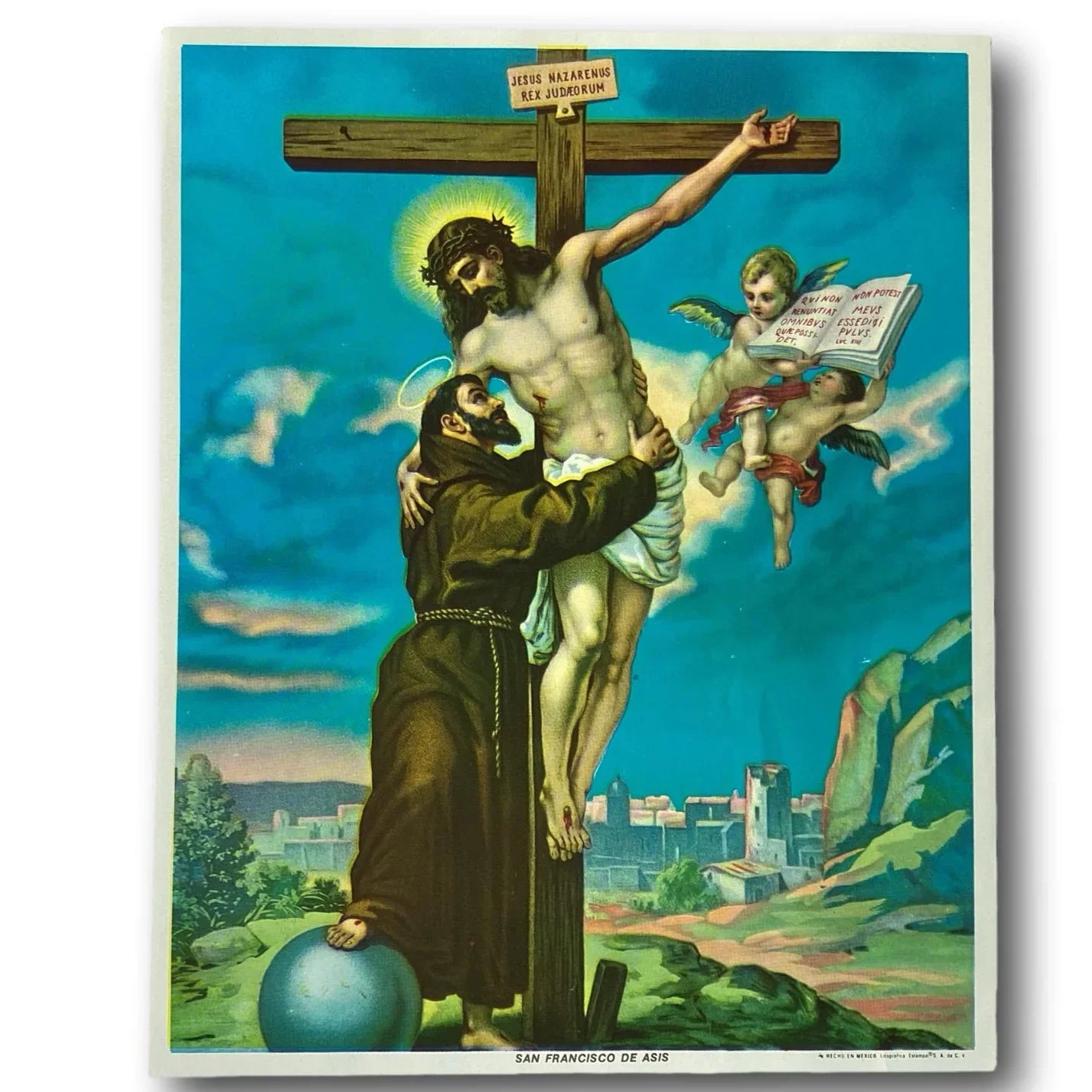 Framed Catholic devotional print of Saint Francis of Assisi embracing the cross, religious art from Ysleta Mission Gift Shop.