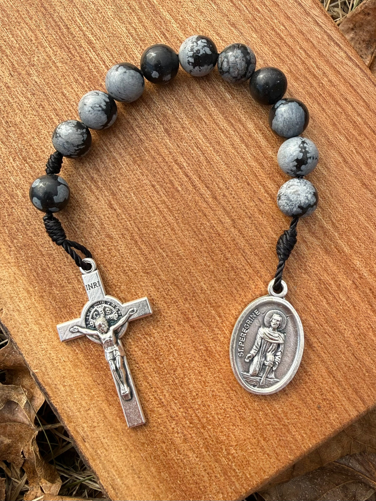 Catholic pocket rosary with snowflake obsidian beads and Saint Peregrine medal, one decade, by Liza Murphy.