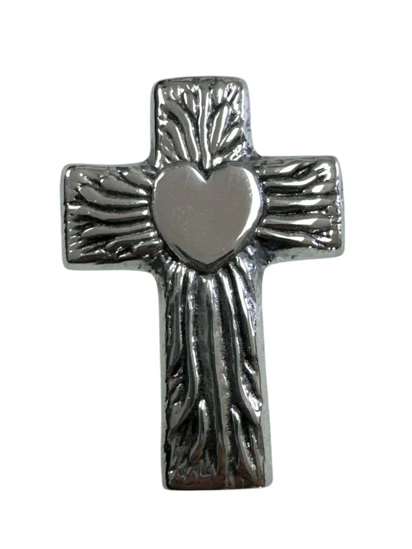 Small handcrafted pewter Catholic cross with silver finish, made in Mexico, featuring detailed religious design by Jose Alberto Chavez.