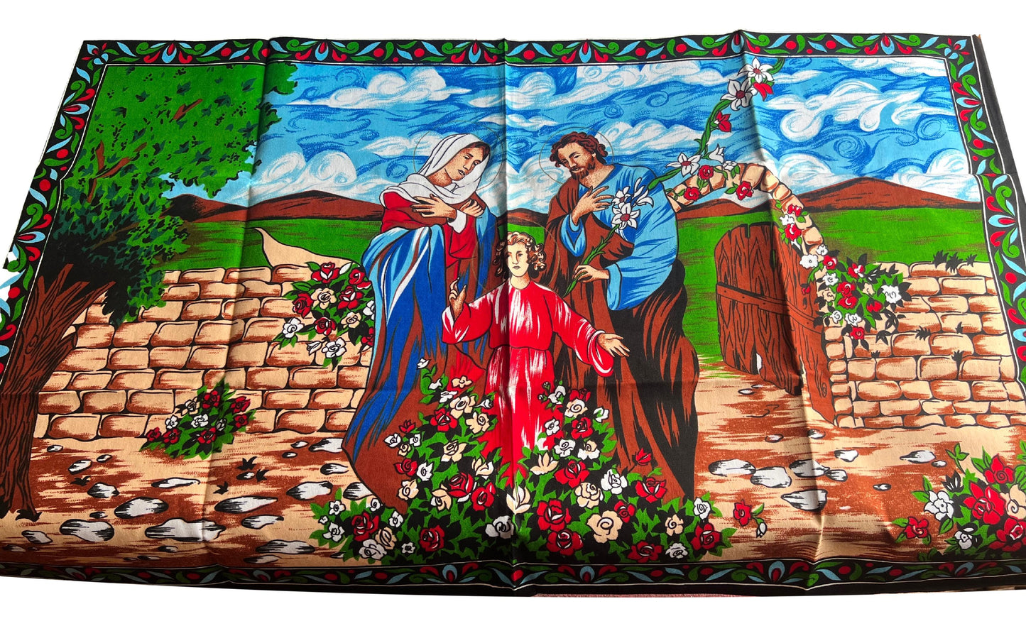 Handmade tapestry featuring religious nativity scene images, crafted by Ysleta Mission Gift Shop.