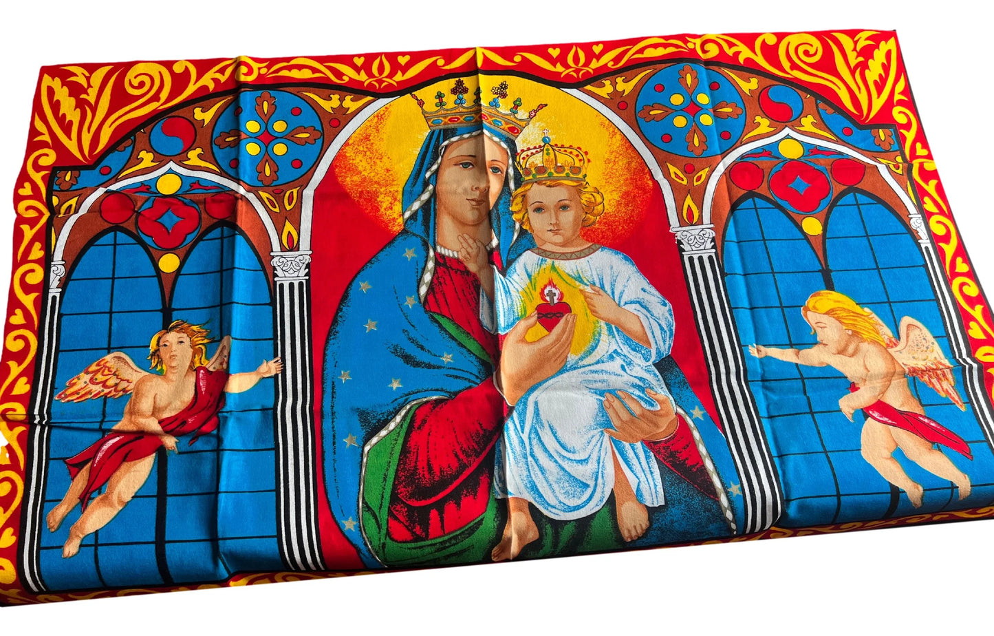 Handmade tapestry with religious nativity scene images, showcasing intricate designs from Ysleta Mission Gift Shop.