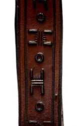 Vegetable-tanned leather keychain from Consuelo Barraza, wearable as belt loop or wrist strap, with metal clasp and durable design.