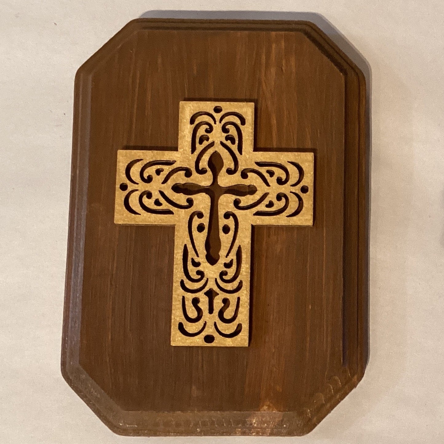Wooden cross wall decoration from Ysleta Mission Gift Shop, a Catholic Christian gift featuring carved wood design.