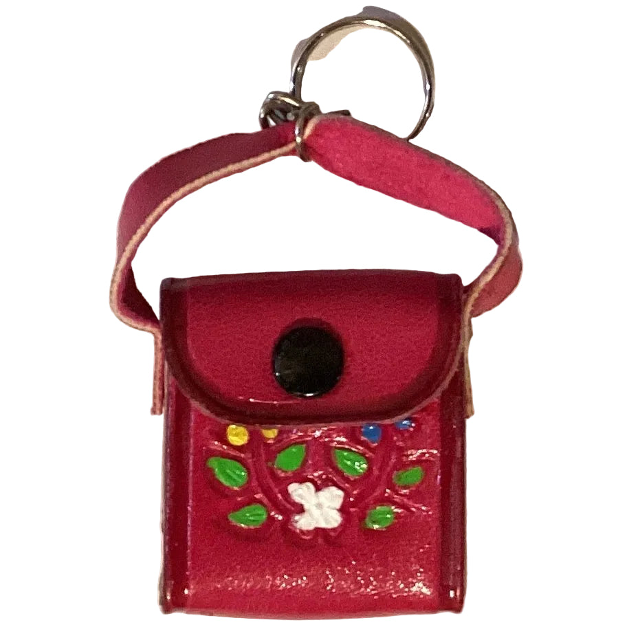 Mini leather crossbody purse keychain in western style, featuring detailed craftsmanship and compact design, by Ysleta Mission Gift Shop.