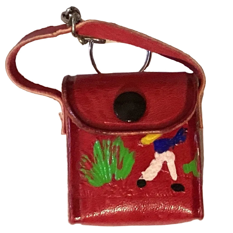 Mini leather crossbody purse keychain in western style, featuring detailed stitching and a compact design, by Ysleta Mission Gift Shop.