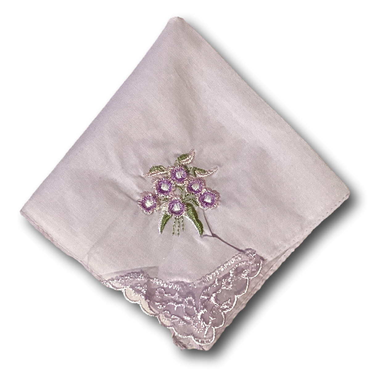 Cotton embroidered handkerchief with intricate floral designs, ideal for home and garden tablescapes, by Ysleta Mission Gift Shop.