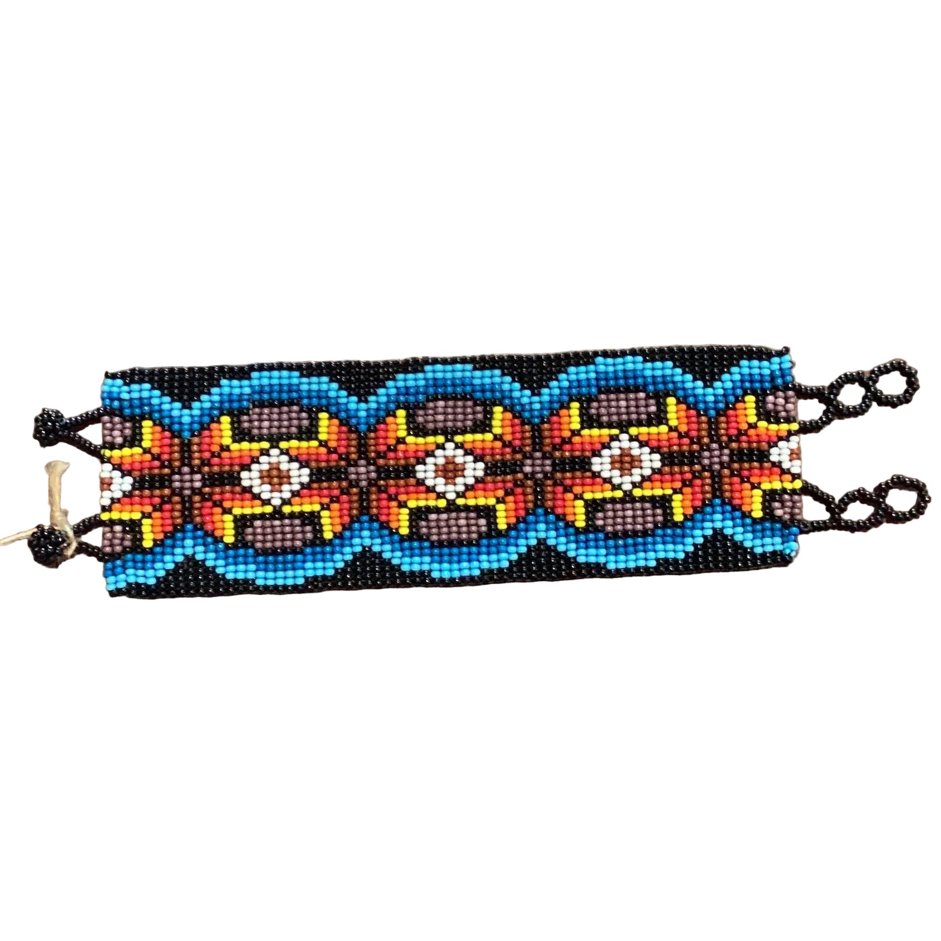 Handmade Mexican beaded wide bracelet by Jose Alberto Chavez featuring colorful intricate beadwork and traditional design.