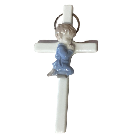Porcelain praying boy figurine holding a cross, 6-inch religious sculpture from Ysleta Mission Gift Shop