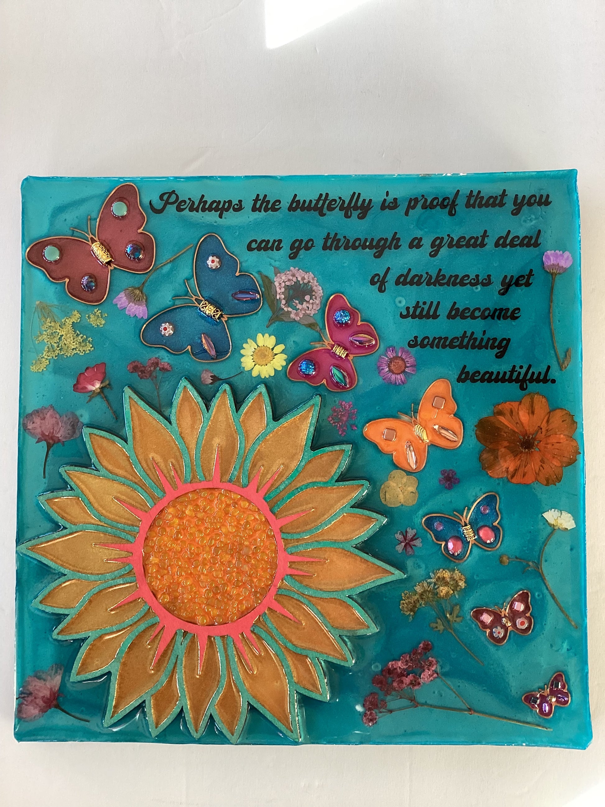 12x12 resin plaque on wood butterflies and dried flowers - Ysleta Mission Gift Shop