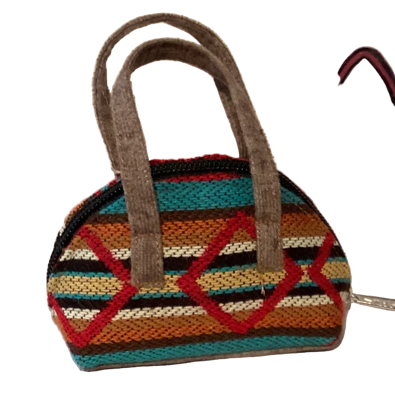 Colorful Ecuador mini textile coin bag by Ysleta Mission Gift Shop, featuring vibrant woven patterns and compact hand-held design.