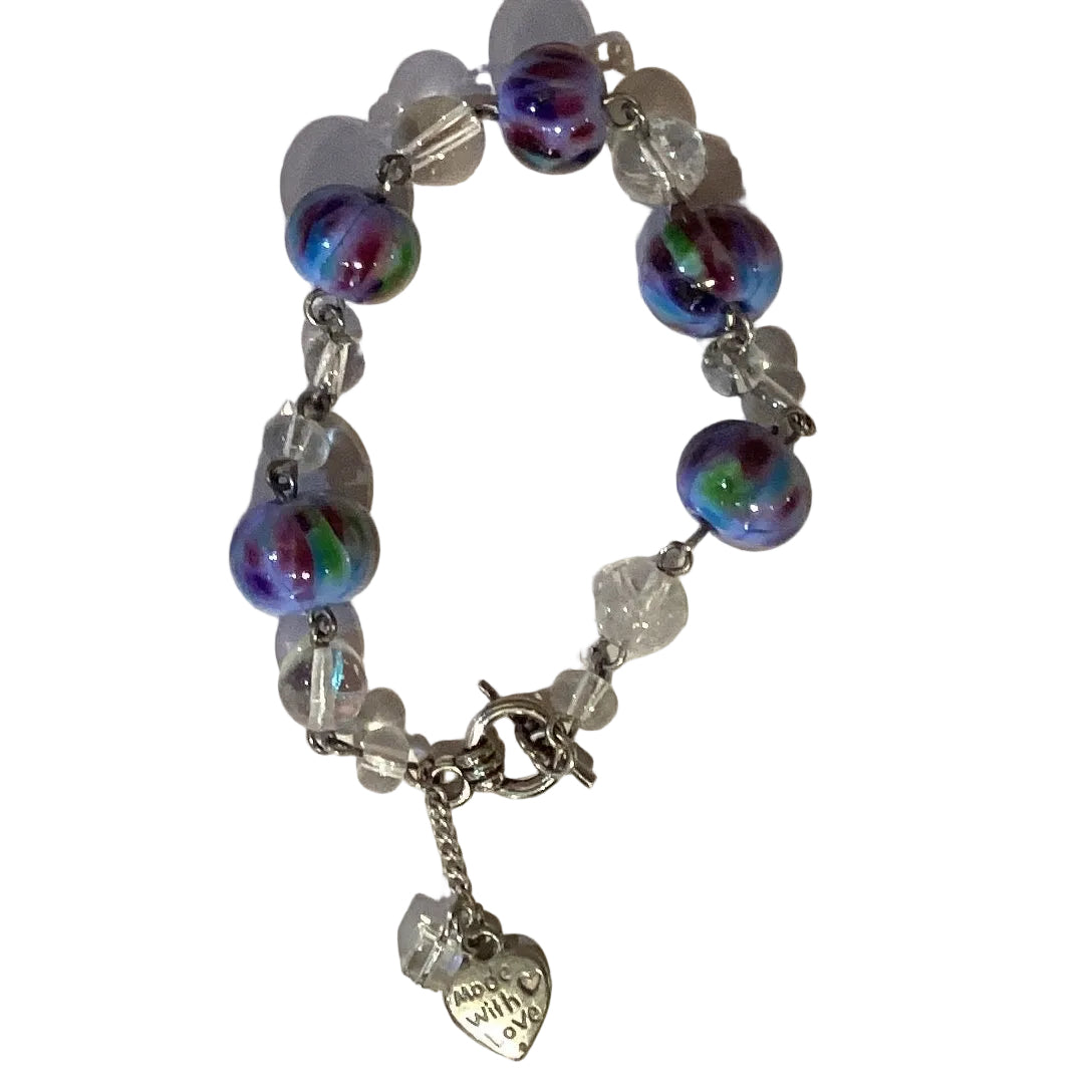 Handmade beaded bracelet in earthy tones, 8-inch length, crafted with love, from Ysleta Mission Gift Shop jewelry and accessories collection.