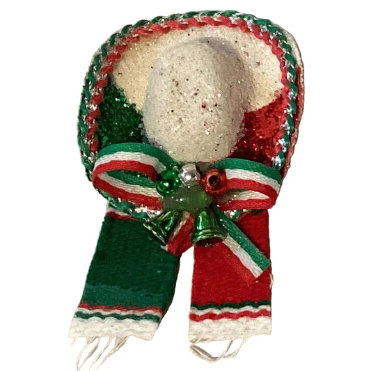 Decorative Mexican sombrero and sarape brooch from Ysleta Mission Gift Shop, featuring vibrant embroidery and traditional design.
