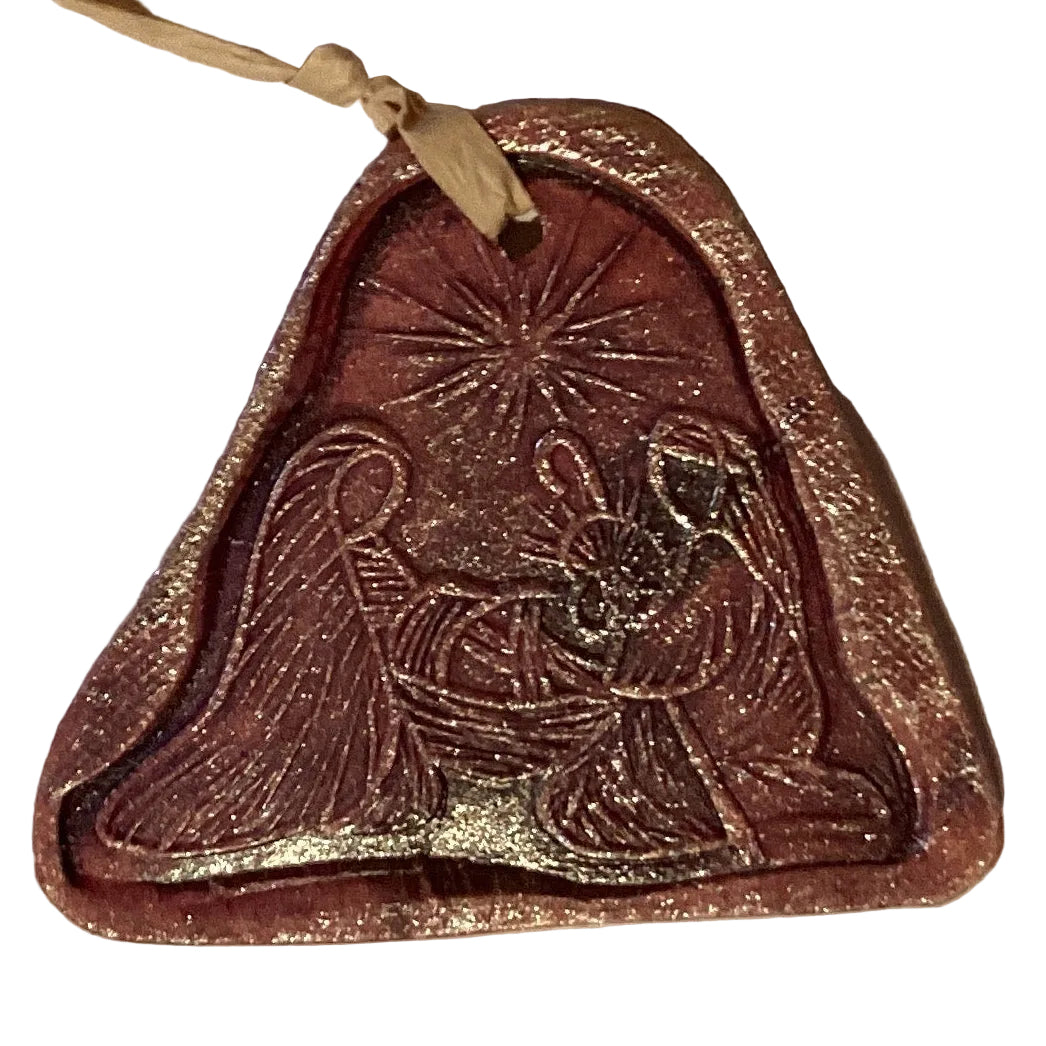 Handmade clay 4-inch decorative ornaments from Ysleta Mission Gift Shop, featuring colorful, handcrafted designs for home décor.