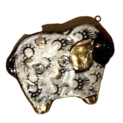 Black and gold lamb brooch, Catholic Christian jewelry, featuring detailed lamb design with gold accents, from Ysleta Mission Gift Shop.