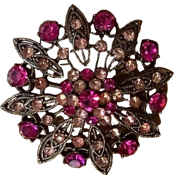 Pink gemstone Catholic brooch with religious design, featuring a 2-inch Christian jewelry piece from Ysleta Mission Gift Shop.