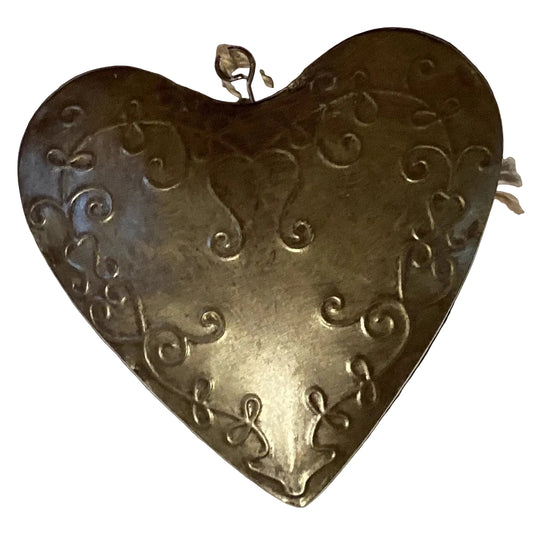 Decorative metal heart ornament from Ysleta Mission Gift Shop, suitable for home and garden décor.