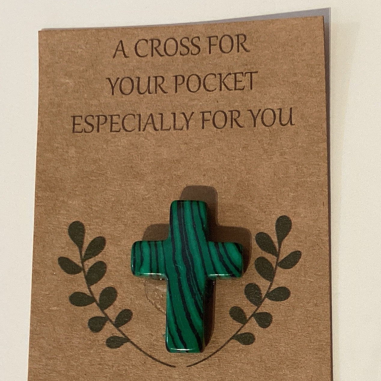 Semi-precious stone cross in pocket size, Catholic Christian gift with a detailed cross design, symbolizing faith and spirituality.