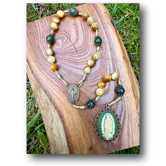 Catholic rosary chaplet featuring Tiger’s Eye and Jade beads with Our Lady of Guadalupe medallion, designed for prayer and devotion.