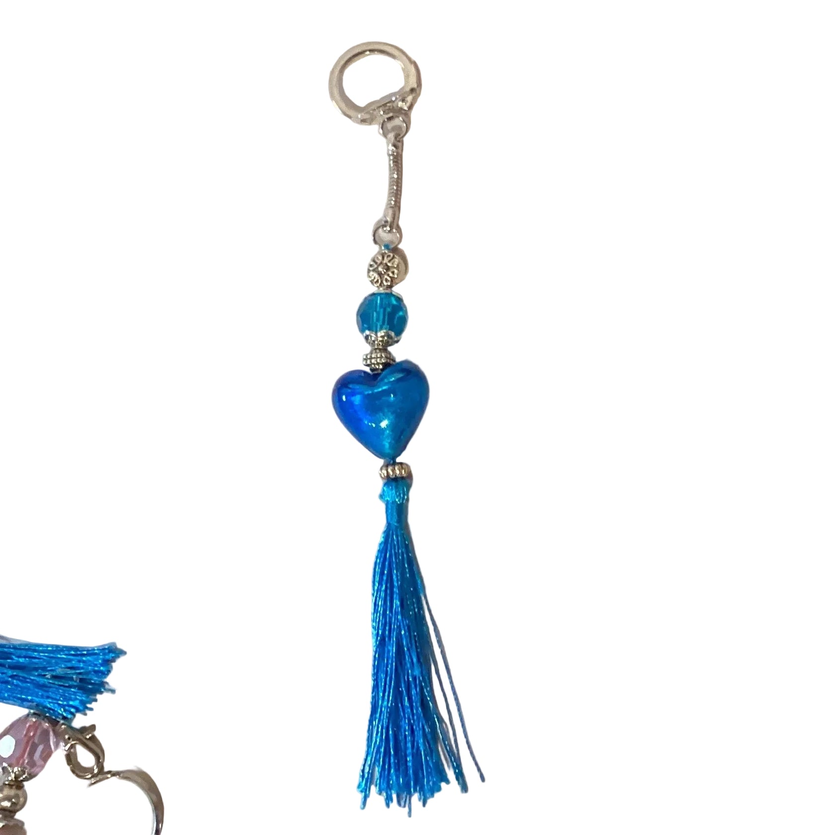 Blue heart keychain with tassel and snap hook featuring snake link, handcrafted by Ysleta Mission Gift Shop.