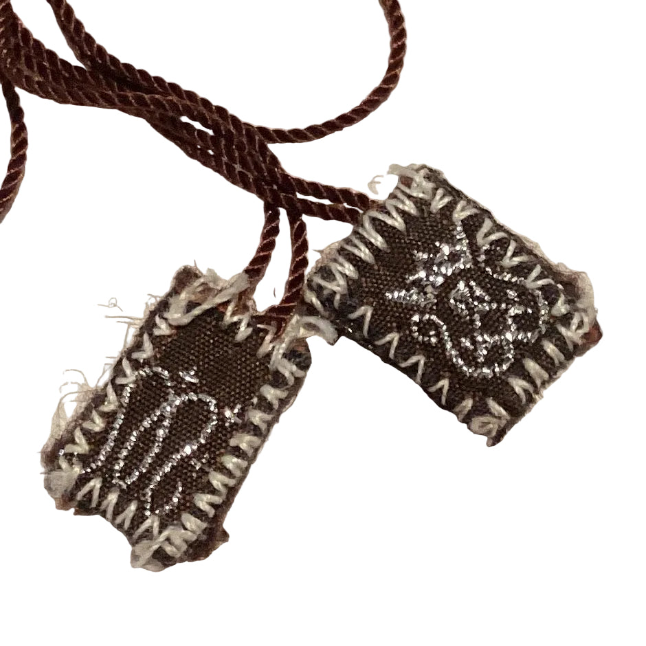 Brown and silver stitching Mount Carmel scapular with detailed Catholic Christian design, featuring religious symbols and embroidery.